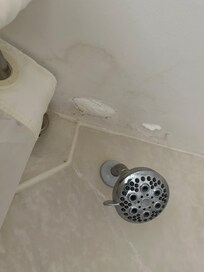 Water stains from leaking pipes from the floor above