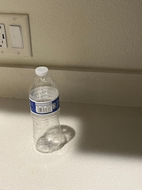 Empty water bottle on counter