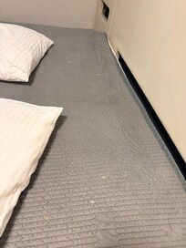 Bed sheets had stains, not to mention mattress was paper thin.
