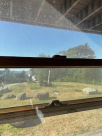 Dirty windows, no blinds and one with broken lock.