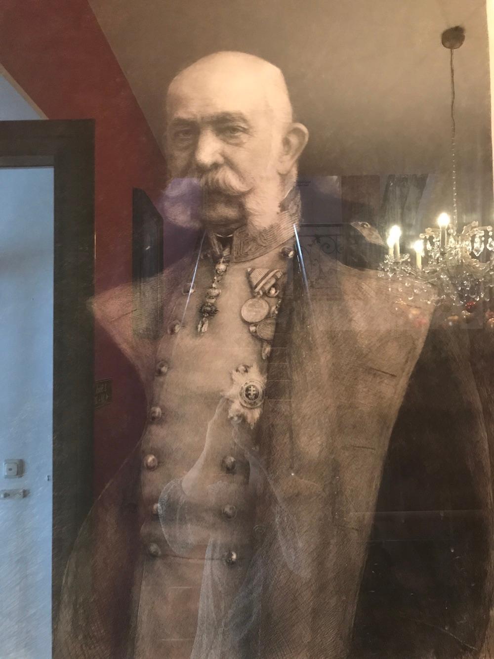 An original pen-and-ink drawing of Emperor Franz Joseph, in the hallway of the Villa Excelsior