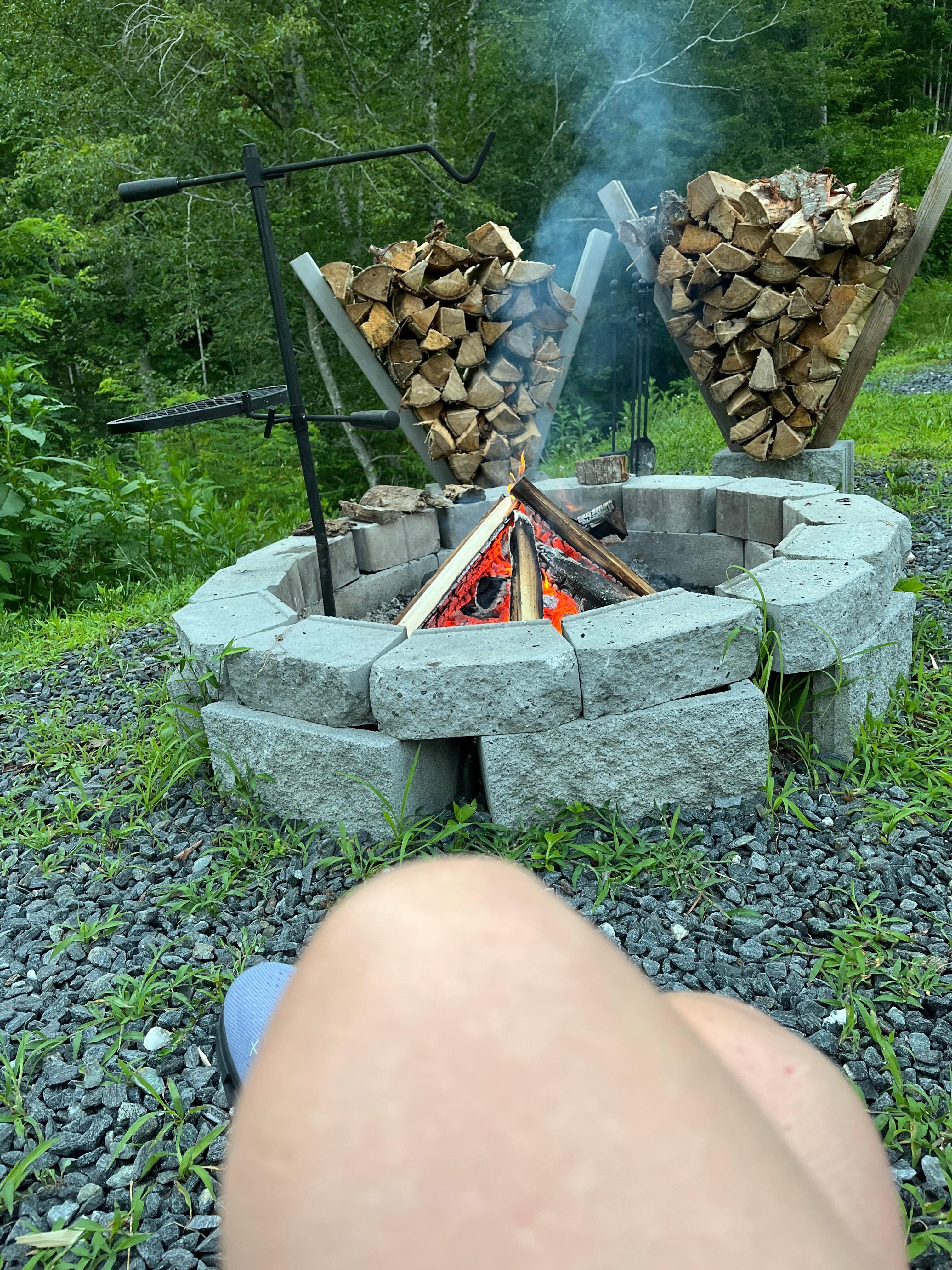 Firepit with plenty of wood provided.
