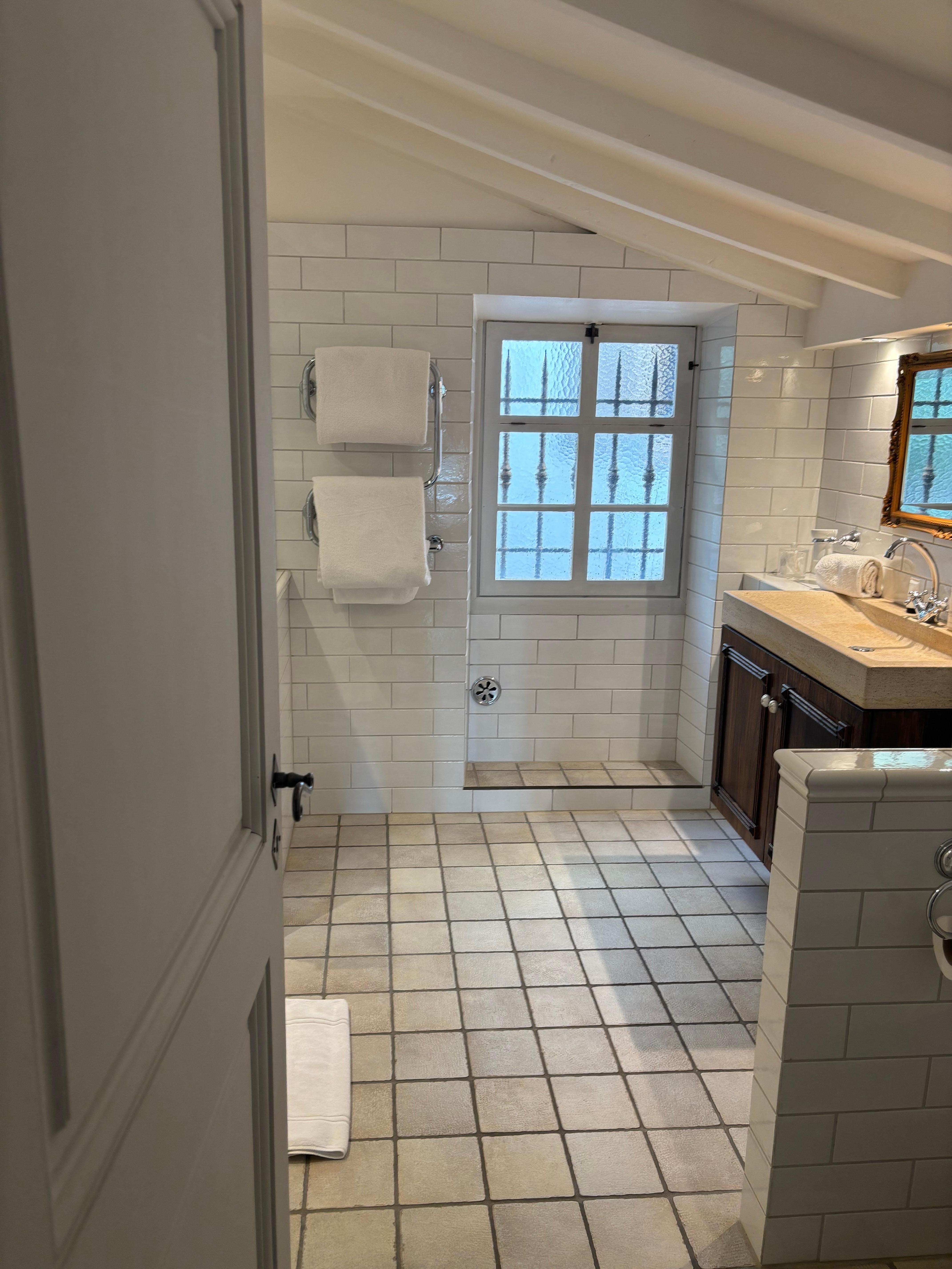 The large bathroom had a double shower.