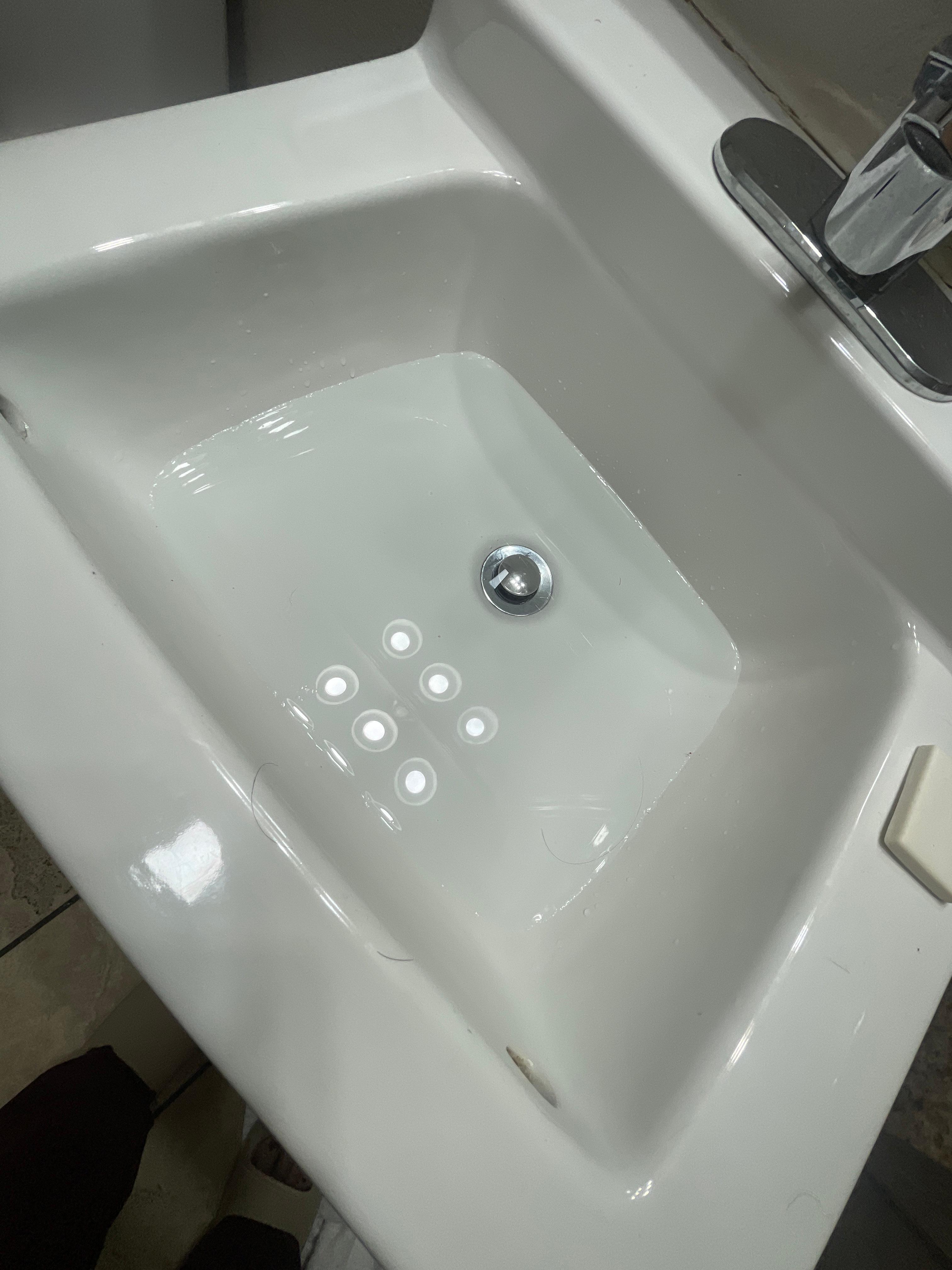 Sink was stopped up.