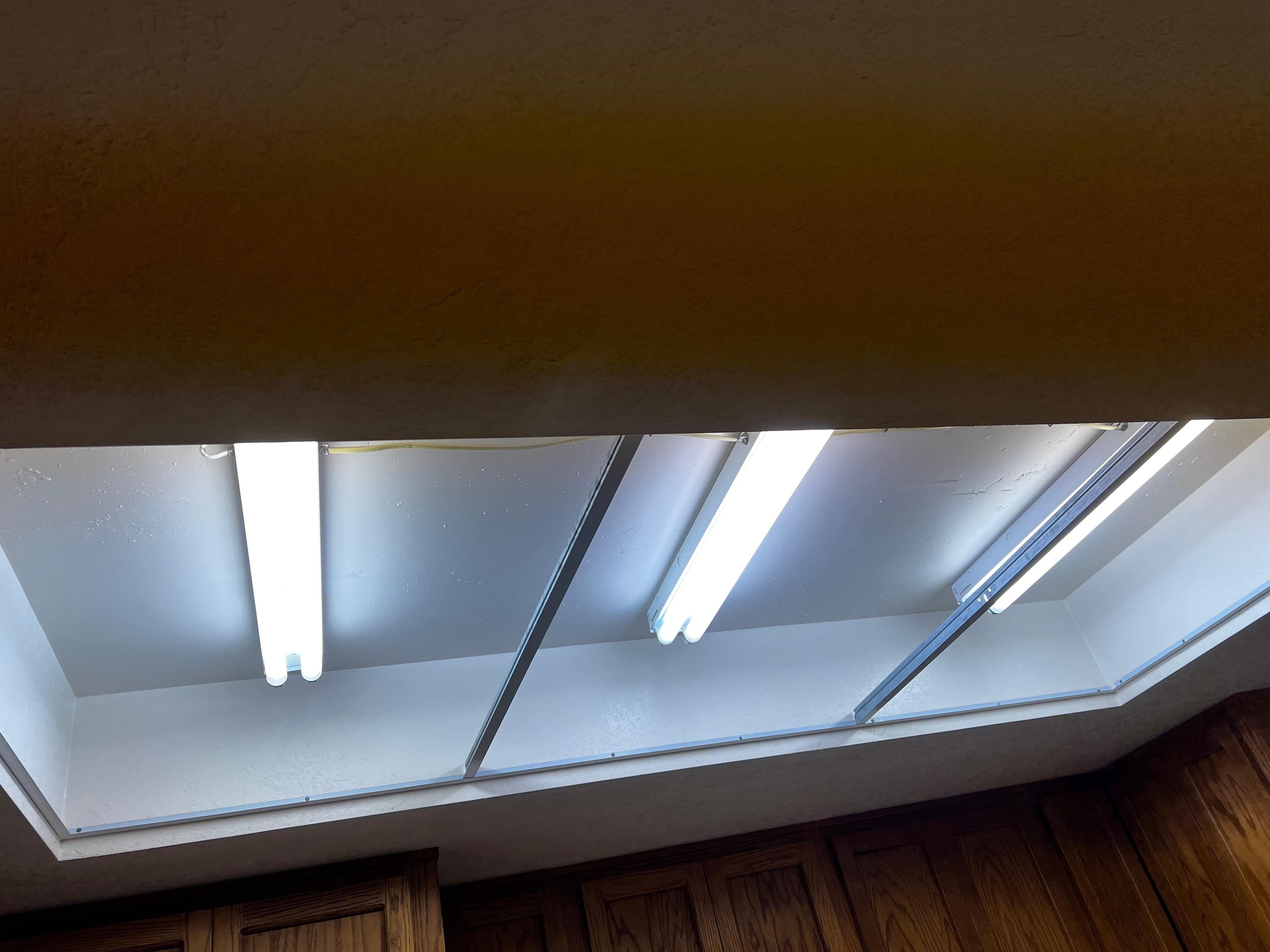 Broken uncovered kitchen light fixture