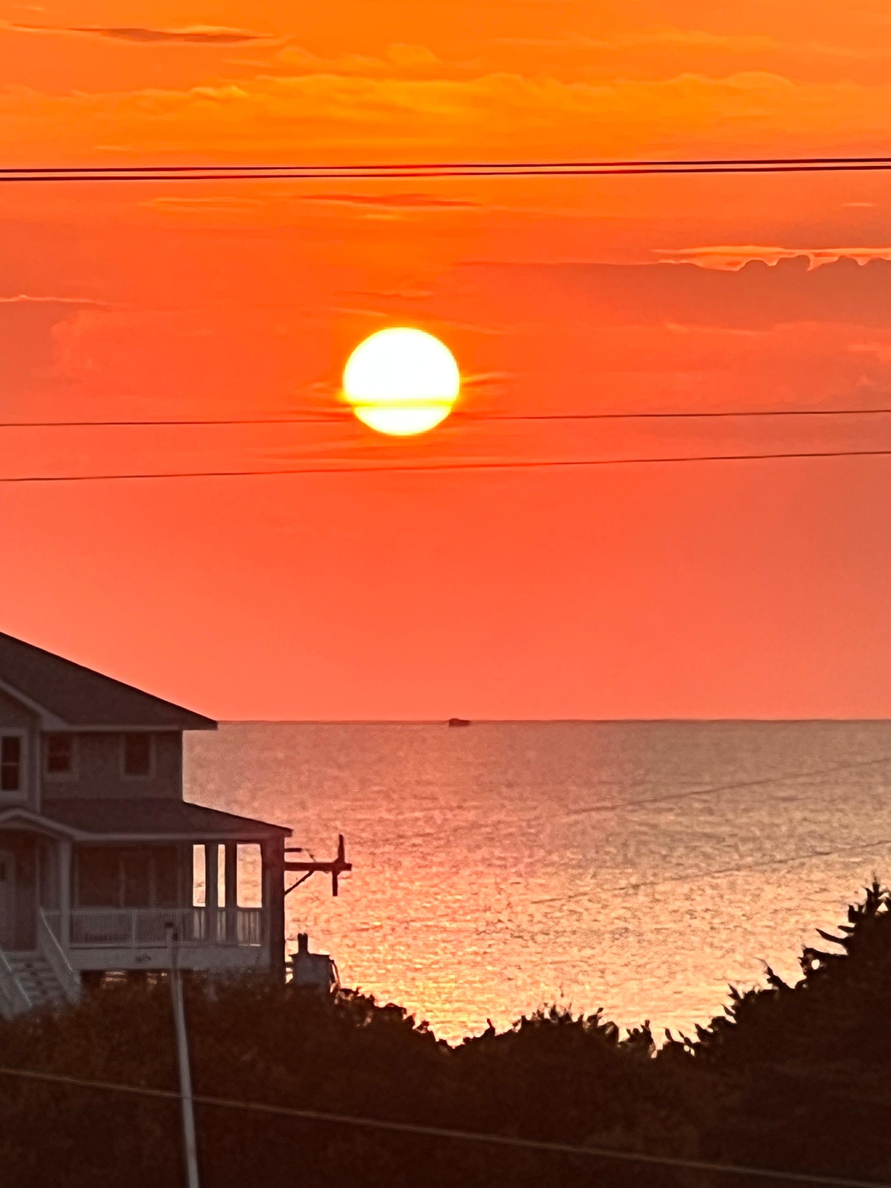 Sunset from back deck of home. 