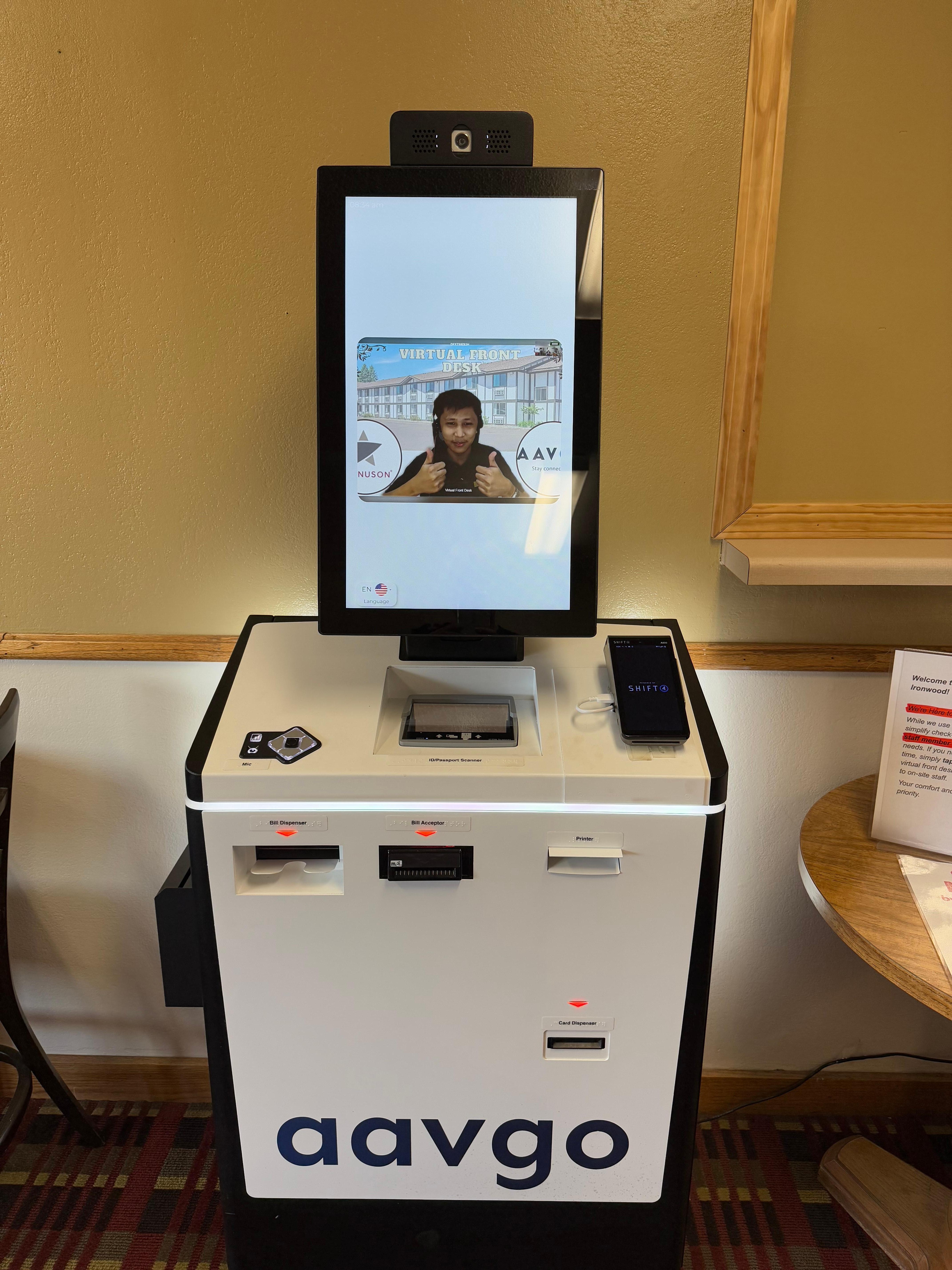 To check in you press the screen and wait for a person to appear. The room key comes out of the machine. Strange but it worked. 