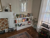 In this picture you'll notice toys for children and there is a small table with 2 chairs for children to play at (not shown in this picture)