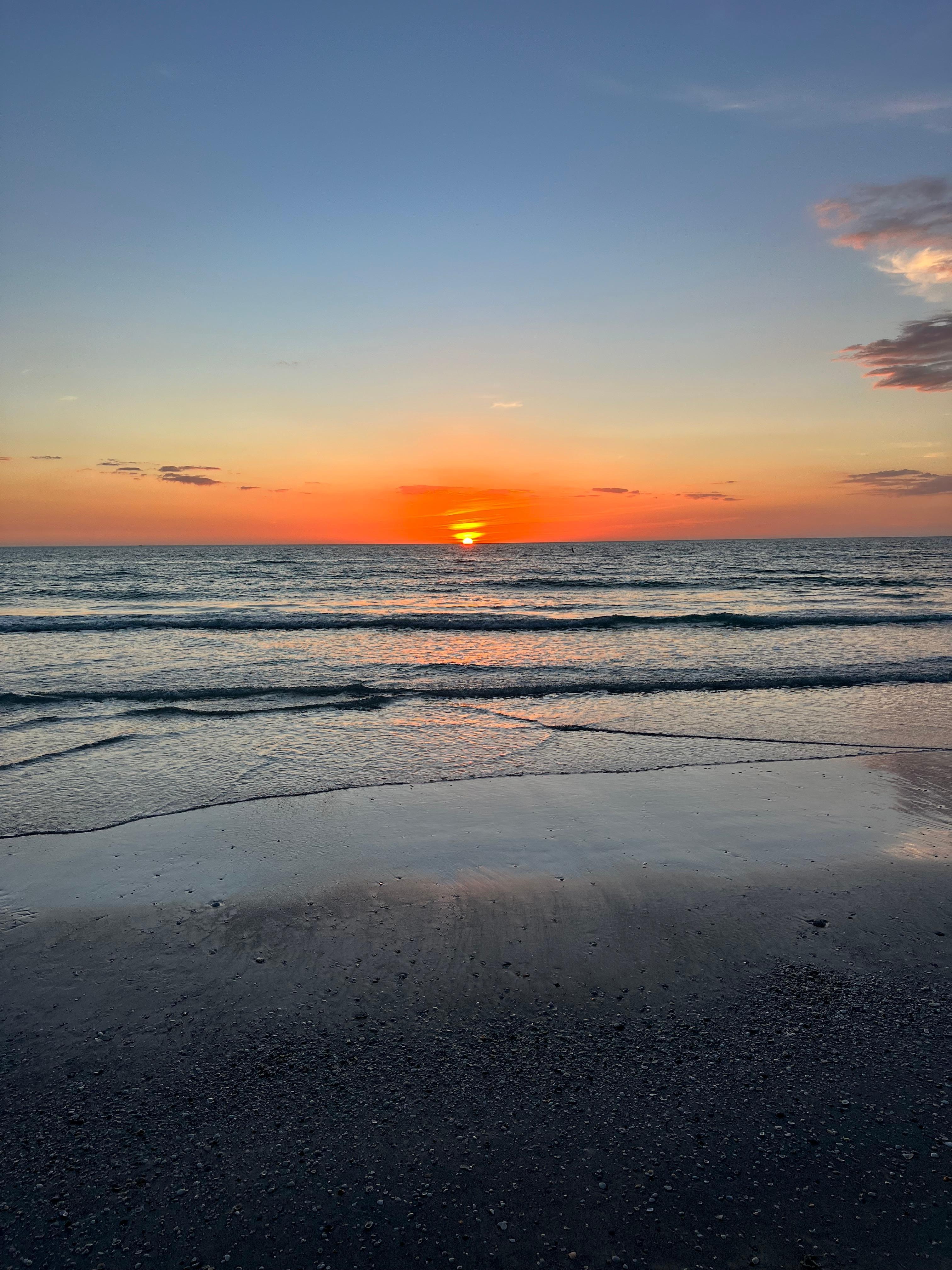 Sunset from beach across street