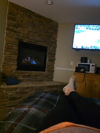 Relaxing by the fireplace