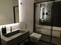 Our bathroom with a bathtub and a separate shower