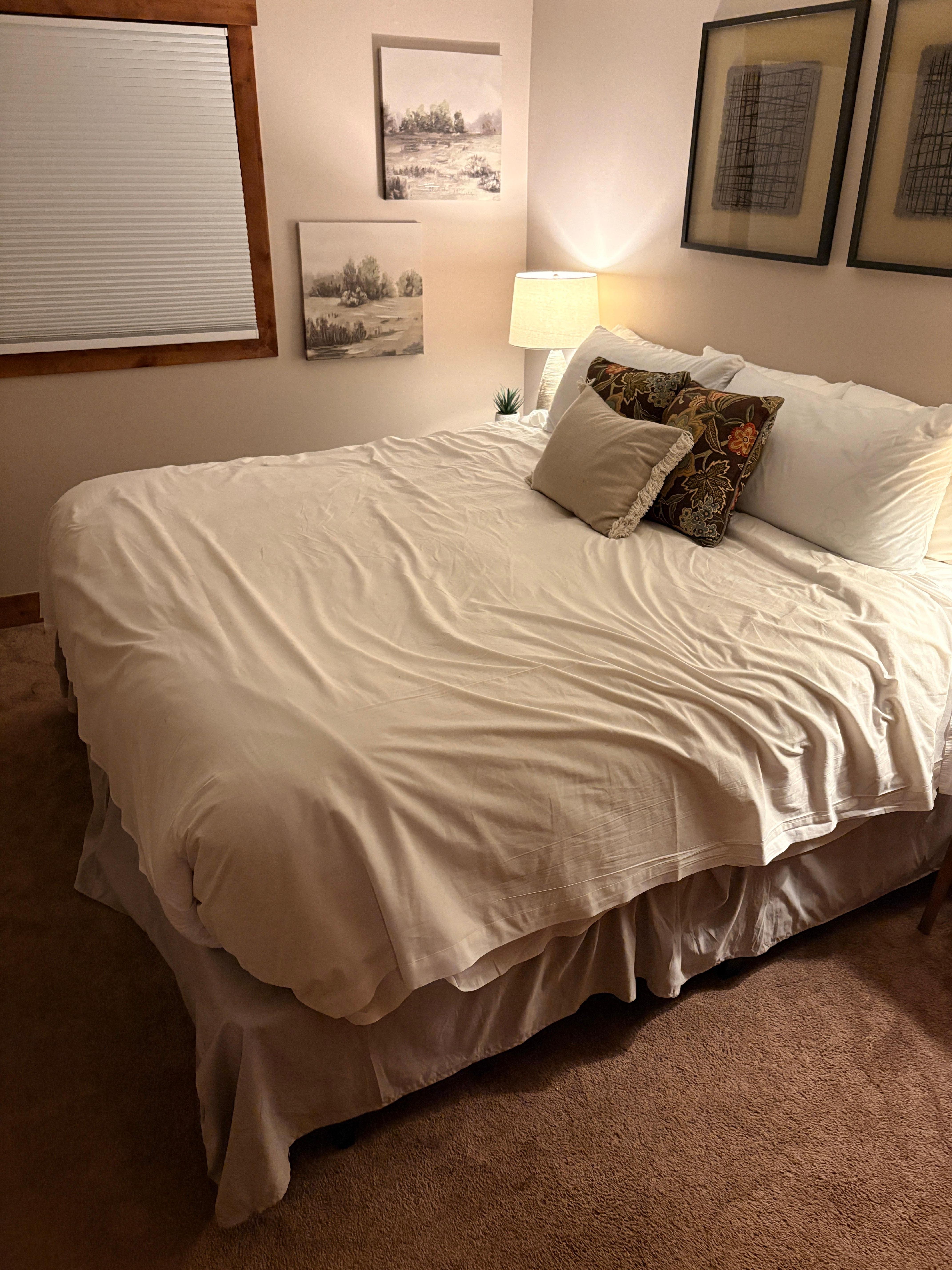 Master bed as I saw it upon entering unit. 