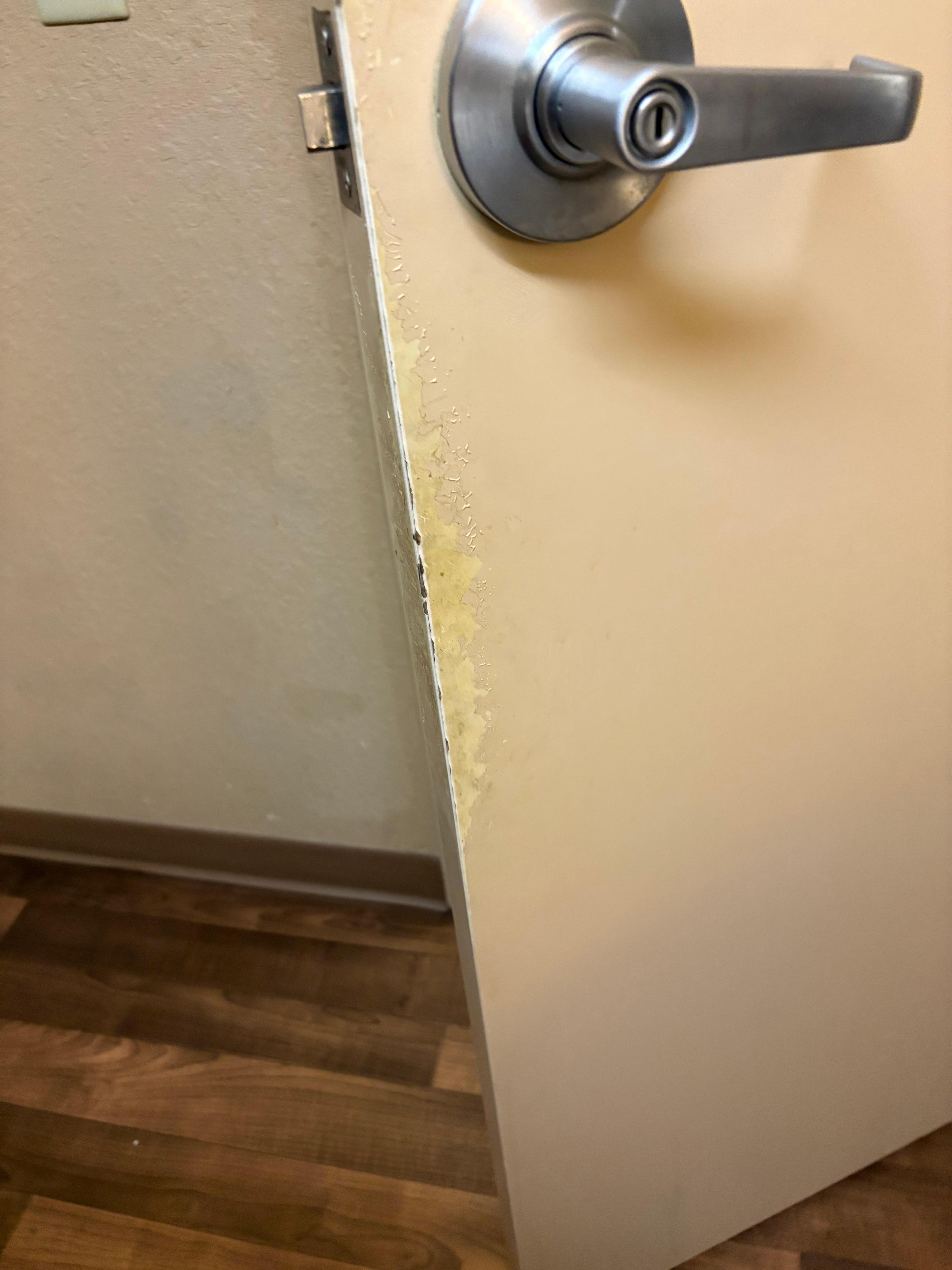 Paint rubbed off bathroom doir