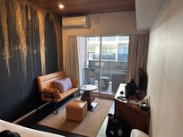 2nd floor room with blinds open.