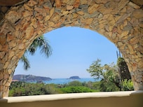 Our private patio facing the pool on the lower level of our unit. A shady place in the heat of the afternoon!