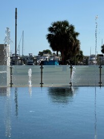 Sitting at the pool watching the dancing water fountain and the marina directly across the street.