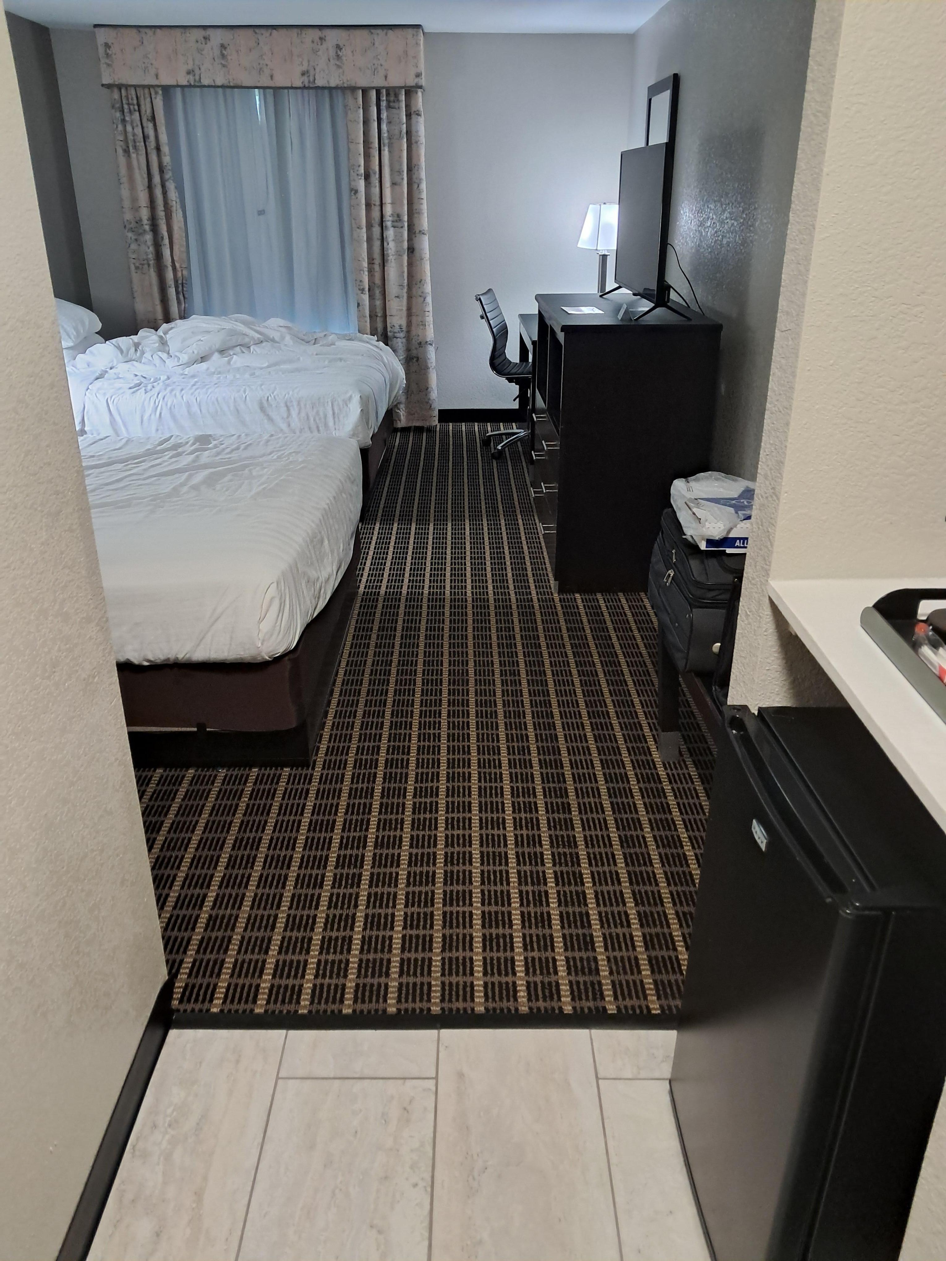 Beds are solid and firm linens are well fitted multiple lights no usb plugs found AC quiet