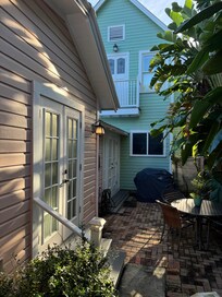 View of small courtyard/patio from back room.
