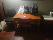 The desk and two chairs.