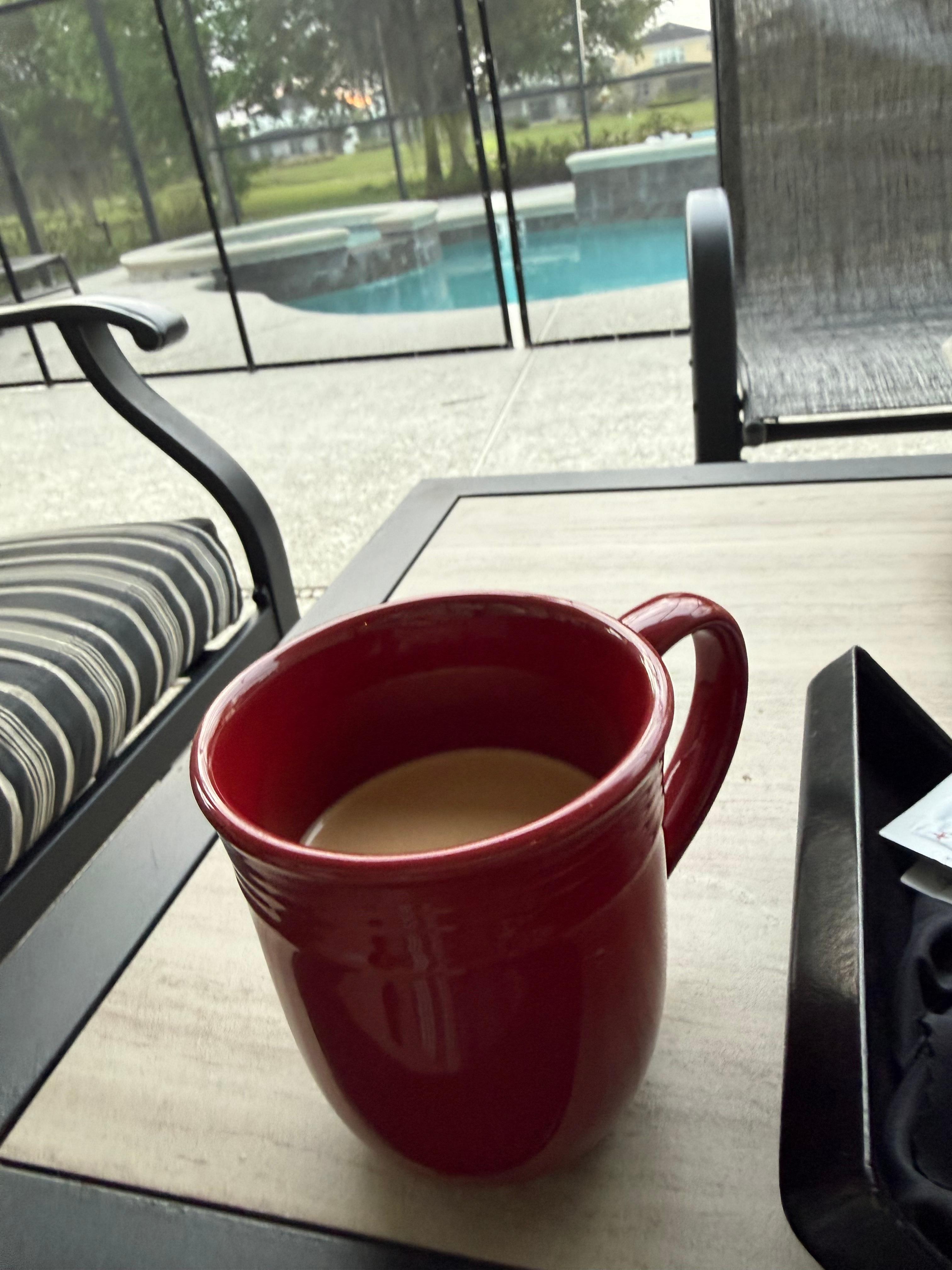 Coffee every morning outside. Hummingbirds love those trees 