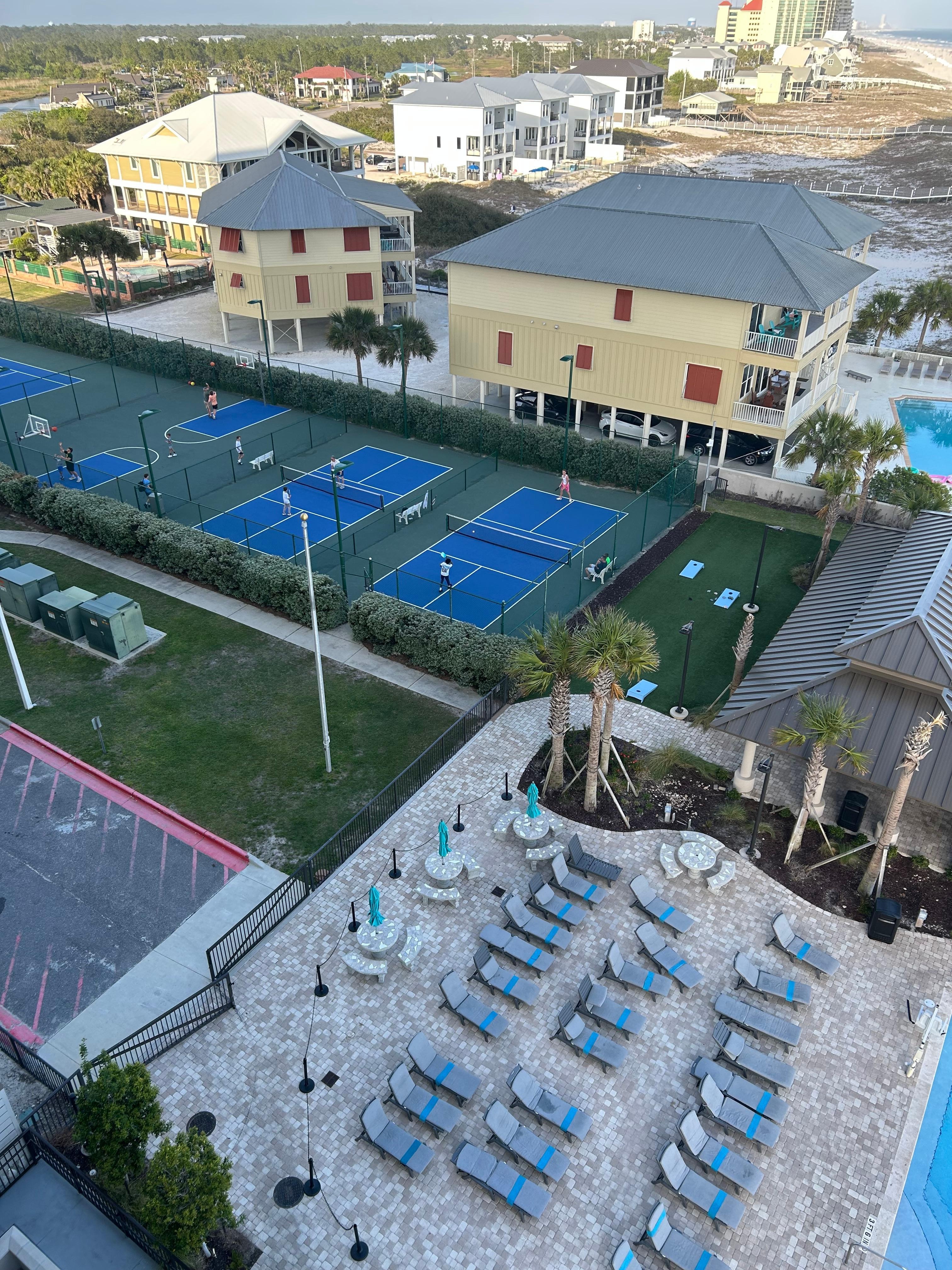Pickleball, tennis and basketball courts plus covered grill area