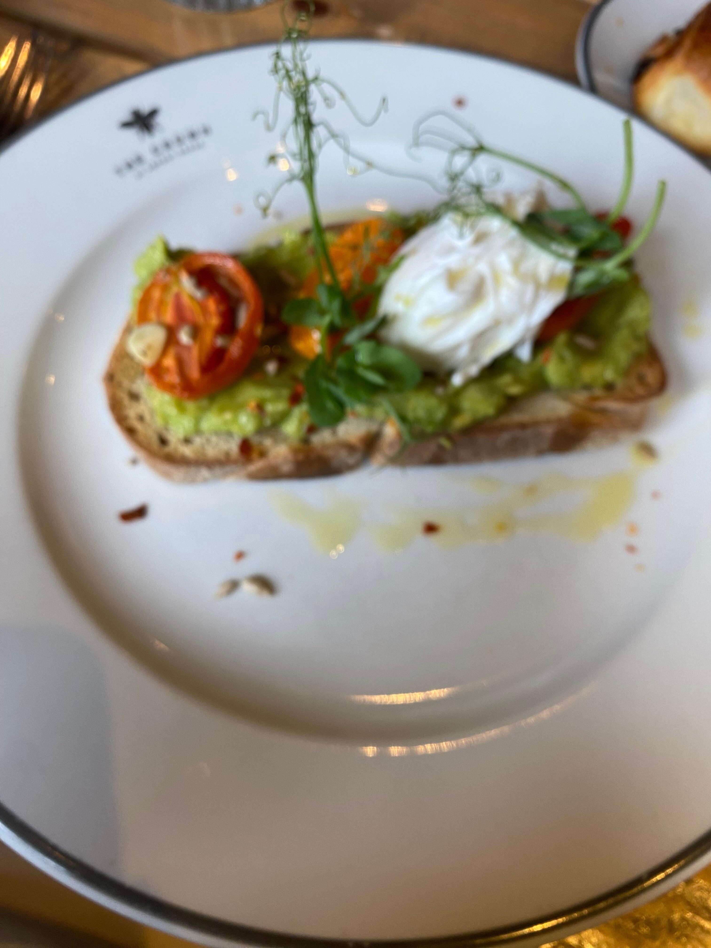 delicious avocado on toast breakfast chosen from menu 