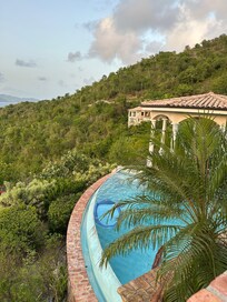 View looking east with a glimpse of the pool and gazebo.