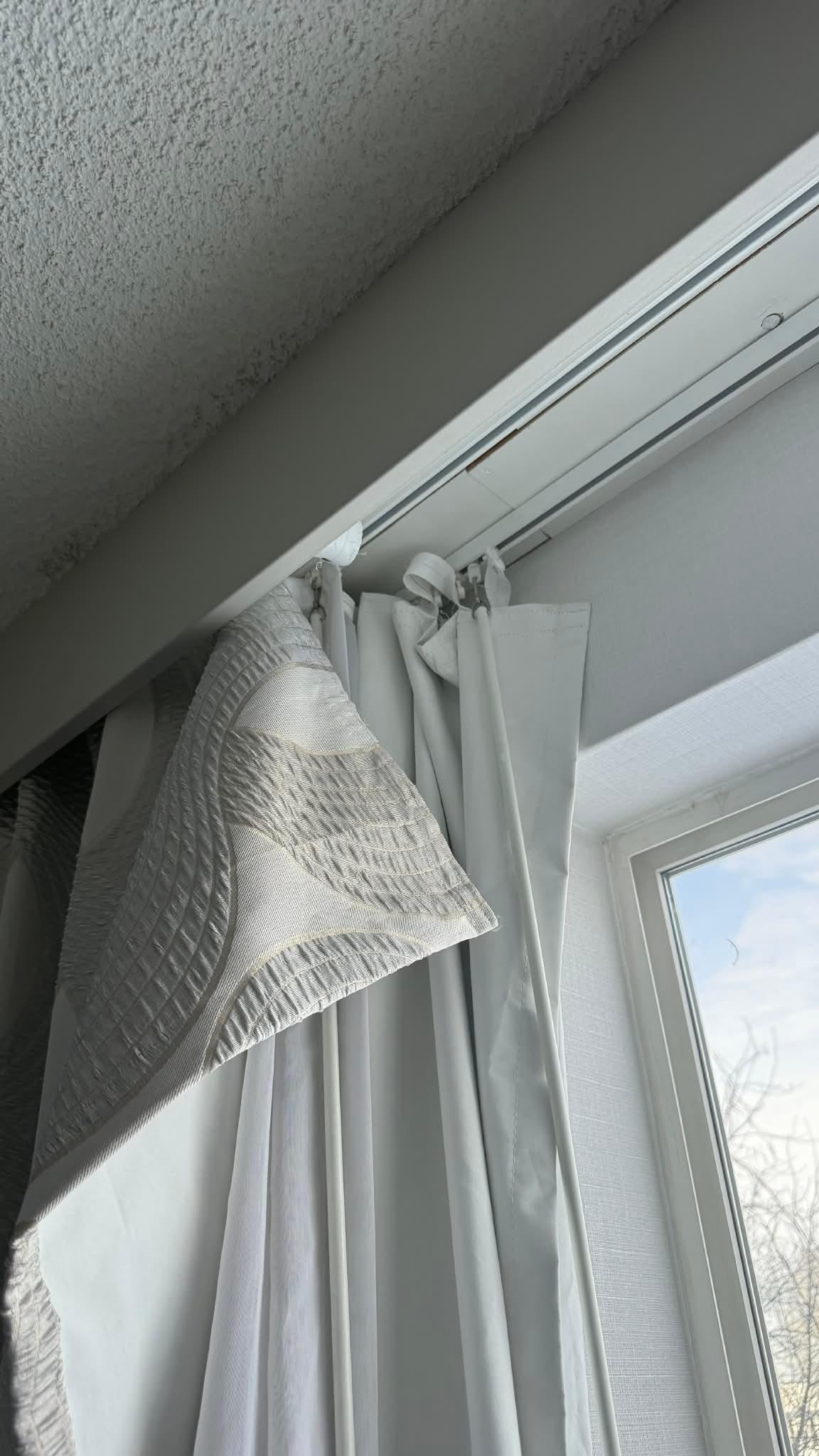 Curtains falling off track