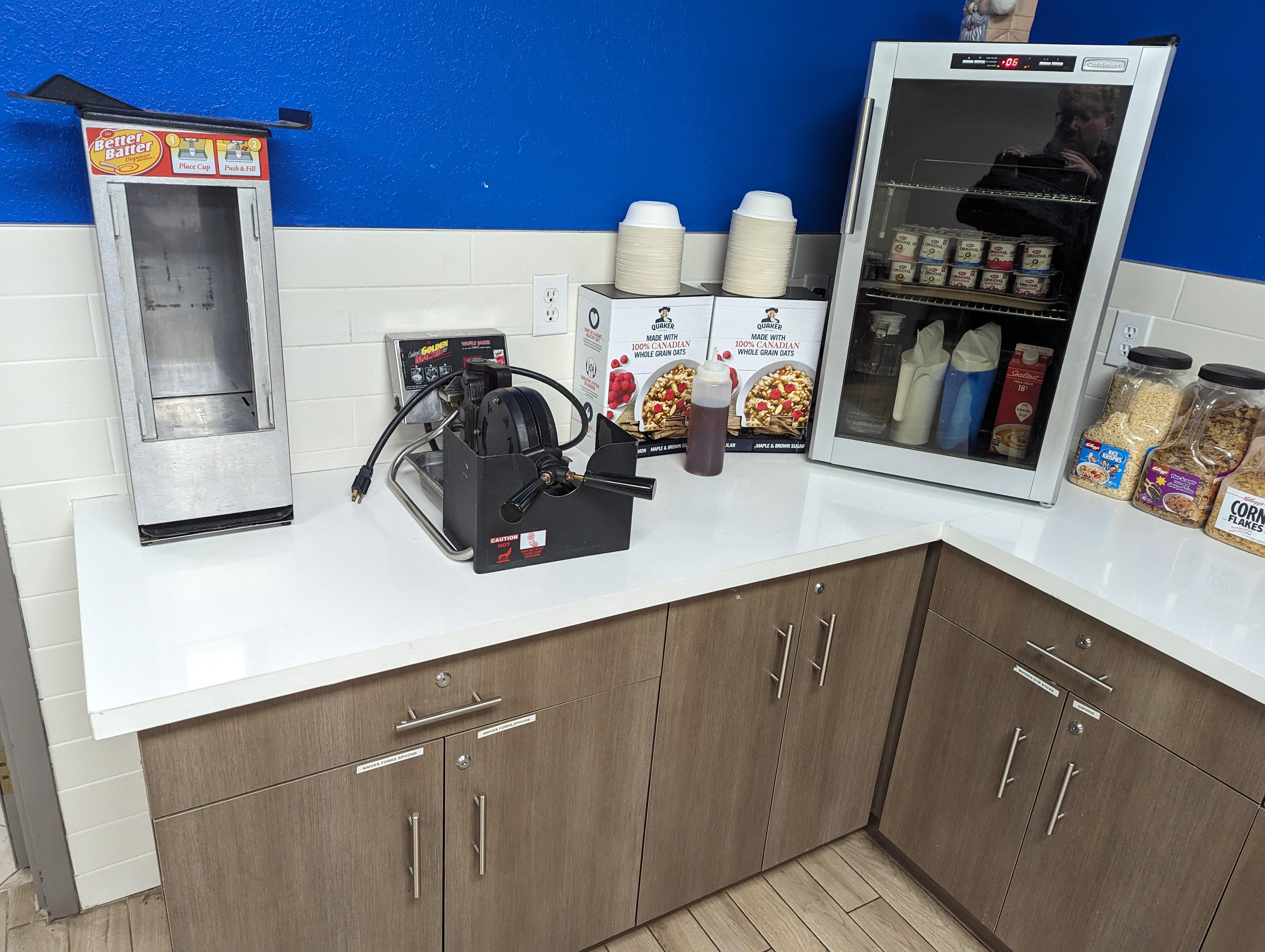 Unplugged waffle maker with no supplies.