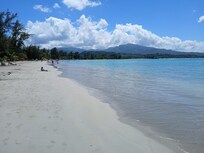 Sandy and clear water