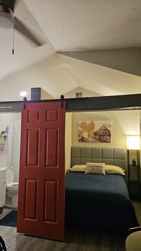 Inside facing the bed and bathroom space, there is also a kitchen space and fridge/freezer in the kitchen with all the things you may need!