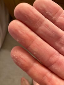 Dust on the headboard in upper master bedroom. It has not been dusted in a long time.