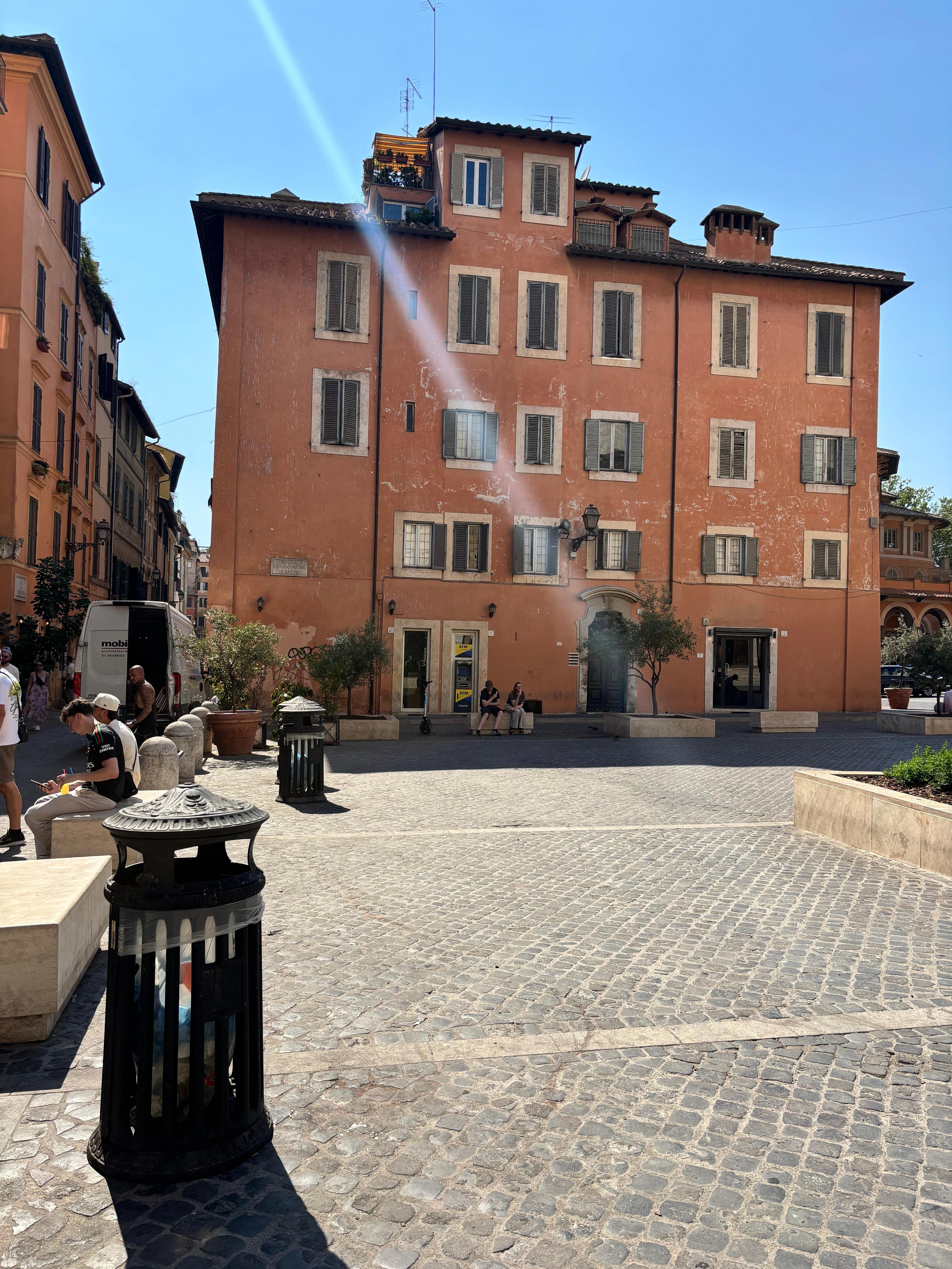 Looking from the square to the first floor corner apartment. 