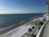 Snow on the beach view from our balcony