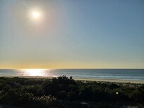 View of sunrise from master balcony.