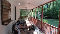 Wonderful covered front porch to enjoy thunderstorms from