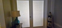 Lights from family room unblocked by bedroom curtains. Also subject to noise from entertainment system.