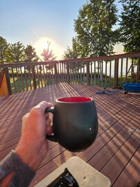 Beautiful morning relaxing with hot tea on the deck