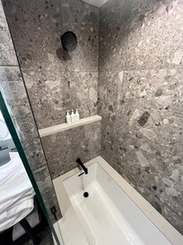 Absolutely no pressure in the shower. Can’t get under the water because the tub faucet sticks out. Also, a poorly designed shower which doesn’t keep water from flower all over the bathroom. We used all the towels to dry the floors.