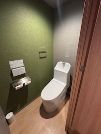 Toilet was in a separate room from the bathroom