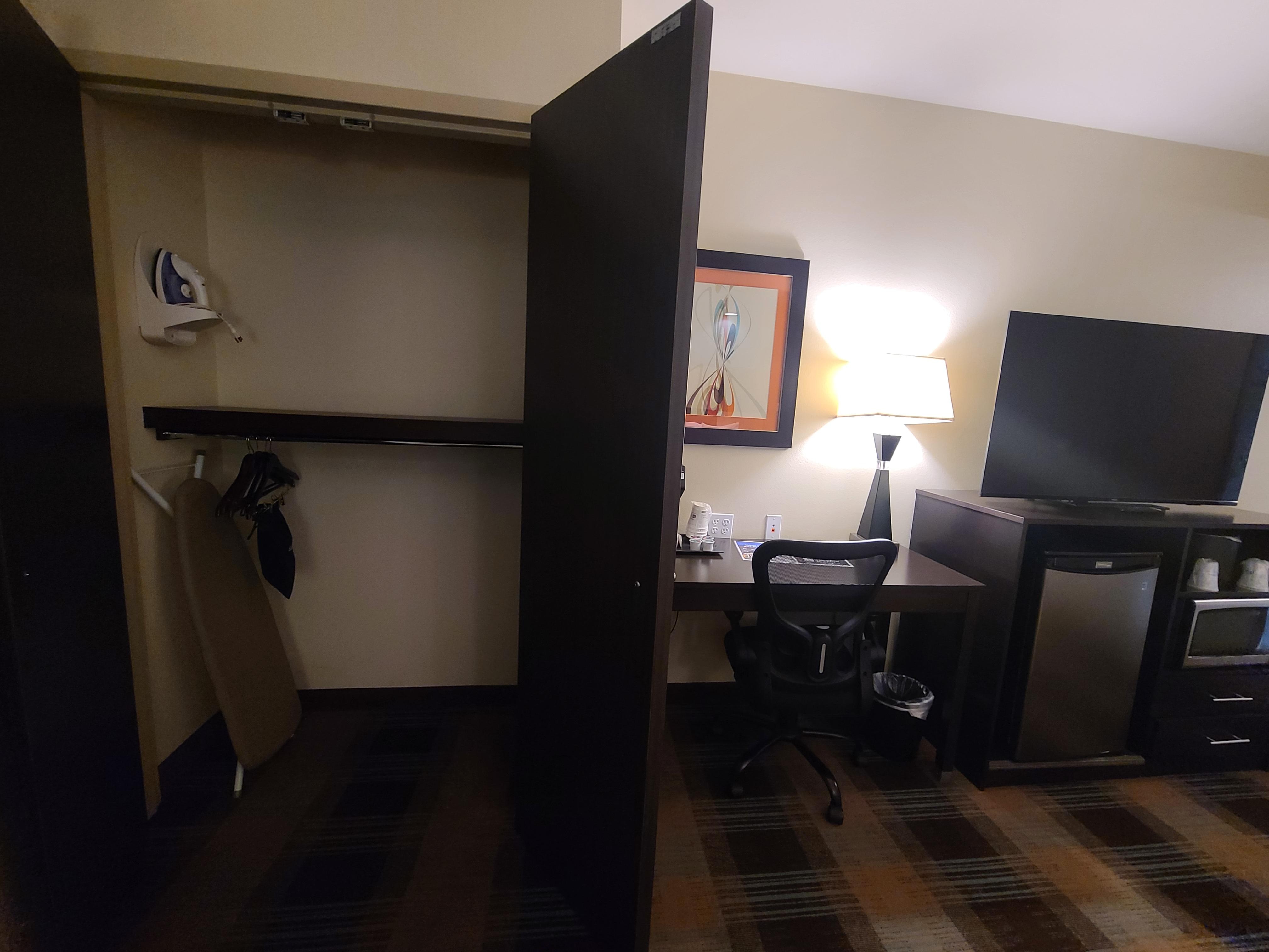 Large closet, desk, large TV, good size fridge and microwave 
