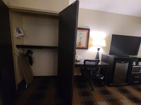 Large closet, desk, large TV, good size fridge and microwave