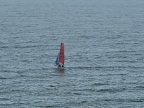 Sailboat viewed from balcony.