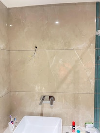 No mirror in bathroom. Wires exposed posing health hazard
