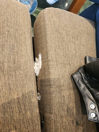 Sofa in Hotel Lobby: partition between 2 seats