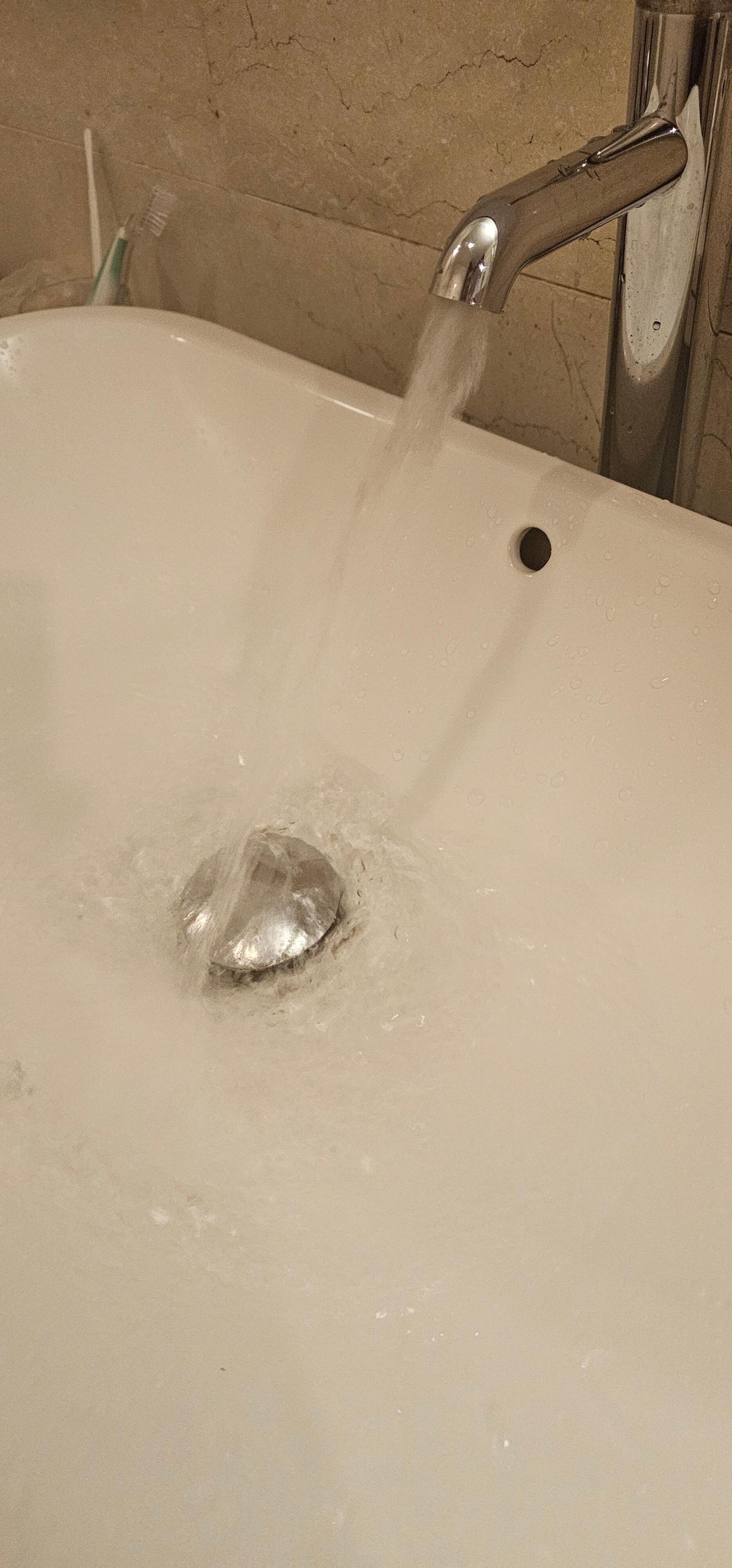 Tap water flow was not very smooth as tap faucet set is old and wear off (Room 1402).