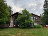 Back of the house looking up from the lake