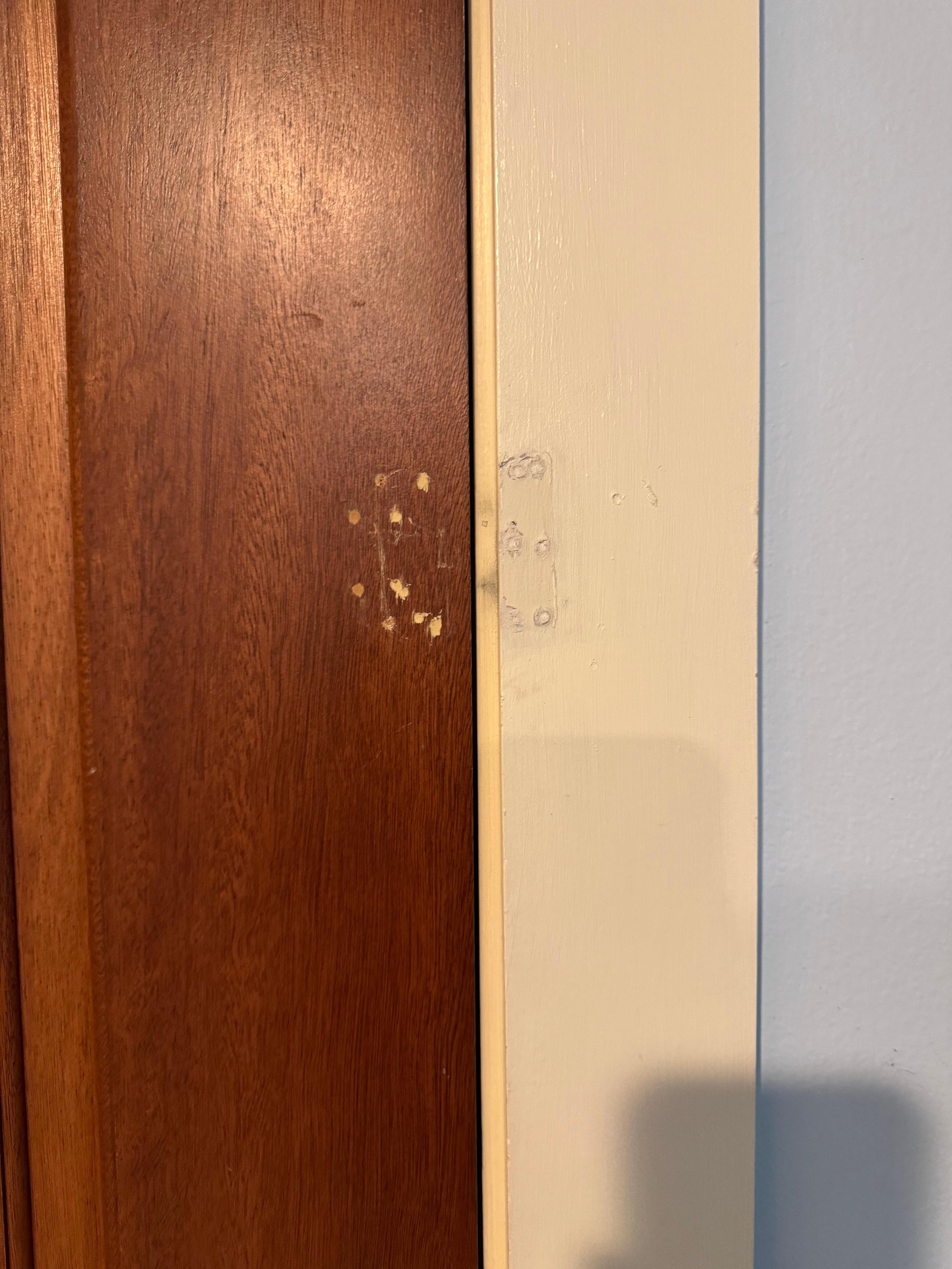 Lock removed from door and poorly patched