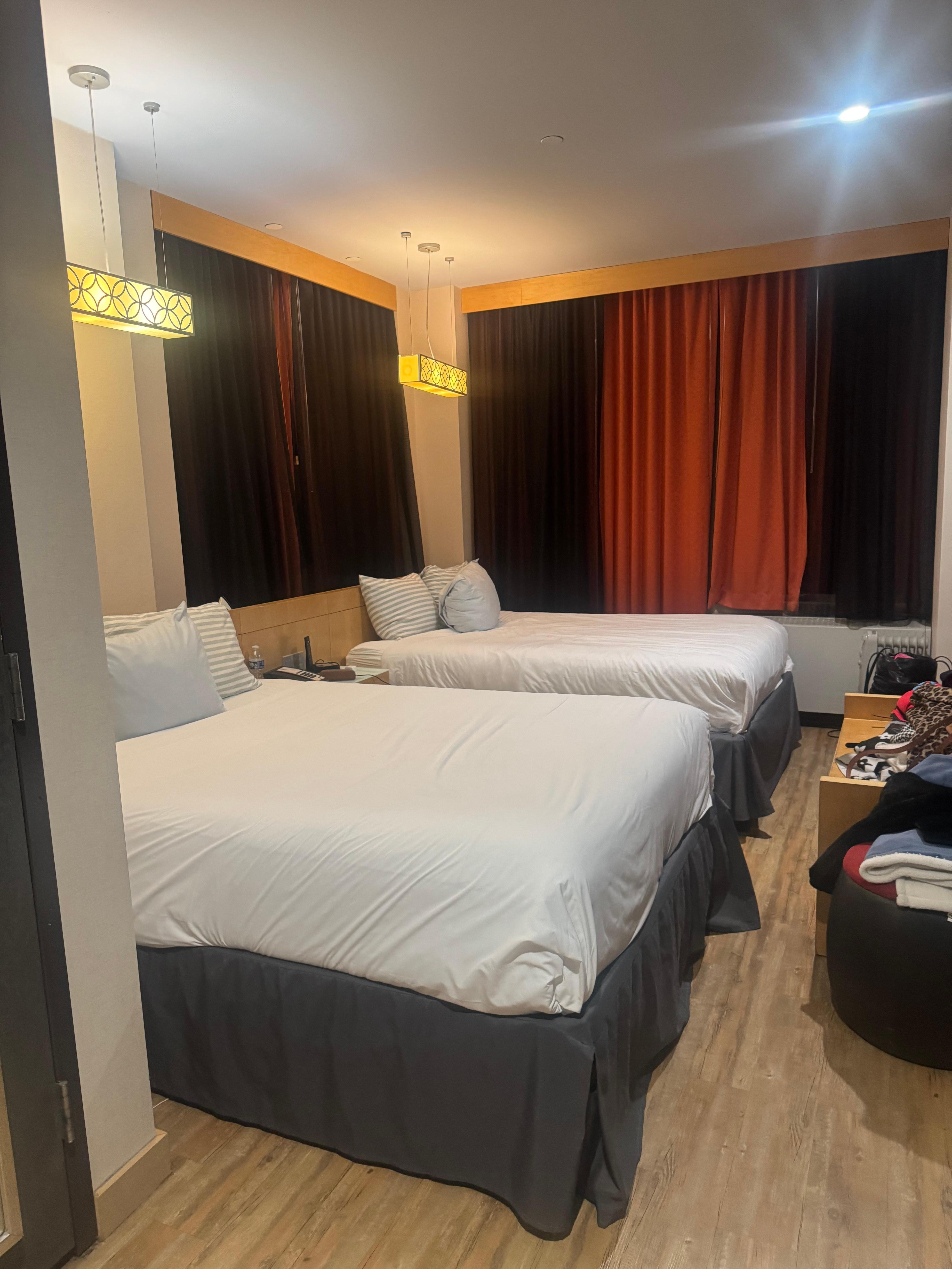 The “bedroom” has a sliding door for privacy from the “living room.” This room has a full bathroom with shower. 