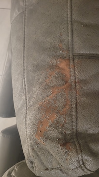 Worn living room sofa